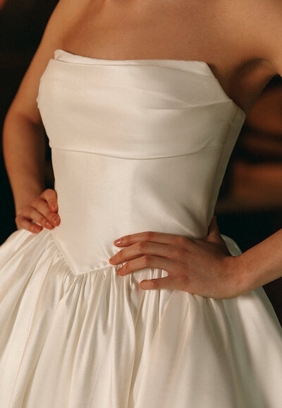 bride and groom holding hands