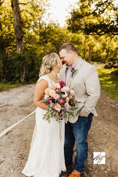 bride and groom embracing