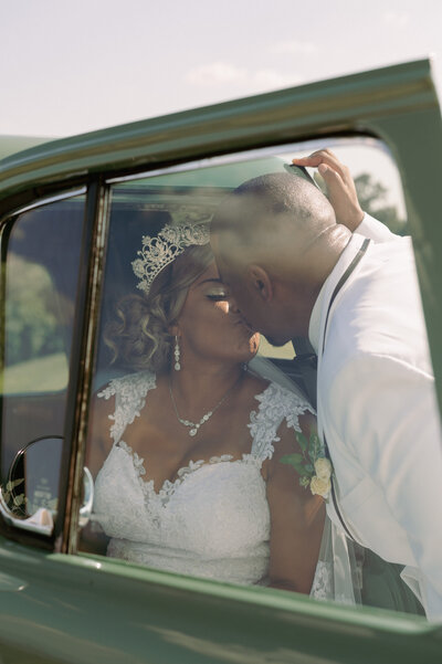 A bride and groom have a dance outside of their churh