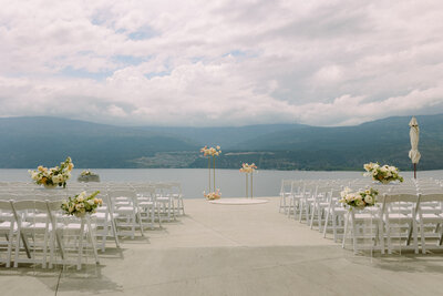 crush pad at 50th parallel estate winery setup for a lake view ceremony