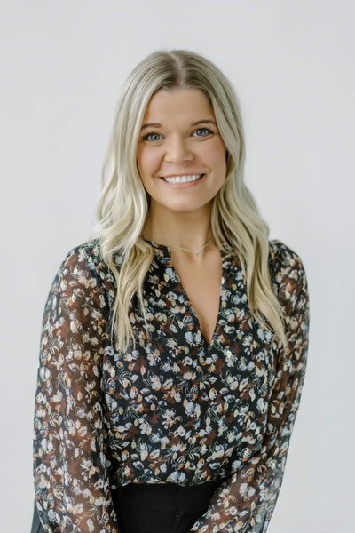 Woman smiling at the camera.