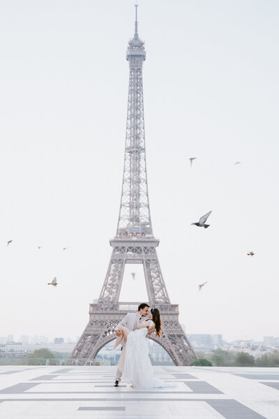 Couple eloping at Eiffel Tower at sunrise