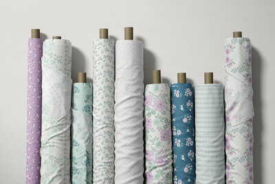 Floral fabric designed by Jennifer in blue, aqua, white and and several shades of purple.