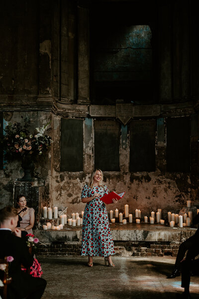 A celebrant performs a non legal wedding ceremony at The Asylum Chapel in London.  