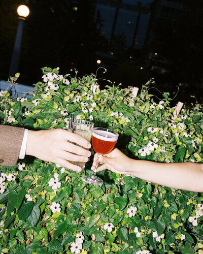 bride and groom toasting their cocktails