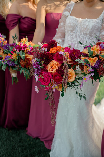 Colorful bridesmaid bouquets at a fall New Jersey wedding.