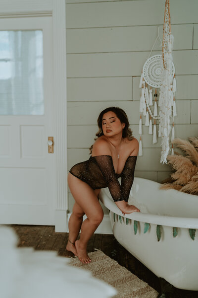 A boudoir session with a gorgeous bath tub setup