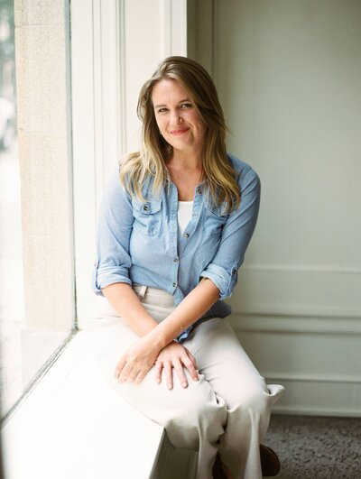 A joyful portrait of Meghan, a hybrid film wedding photographer based in North Carolina