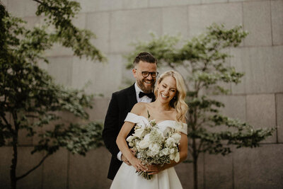 This elegant black-tie destination wedding in Old Port Montreal, captured by Martine L Photography, exudes sophistication and timeless charm. The historic architecture and cobblestone streets of Old Port provide a stunning backdrop for the couple's formal attire and glamorous decor. The wedding features chic black-tie attire, exquisite floral arrangements, and luxurious details that create a truly unforgettable celebration. Keywords: black-tie wedding, destination wedding, Old Port Montreal wedding, Martine L Photography, elegant wedding, historic wedding venue, glamorous wedding decor, sophisticated wedding.