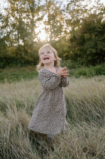 portrait of a child in a field