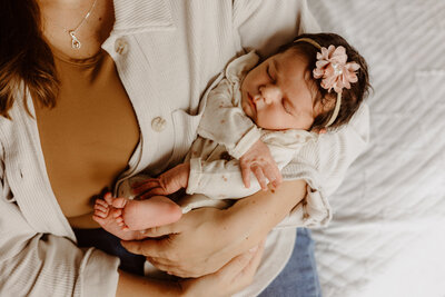 little baby boy during his full studio newborn session in Lincoln, NE