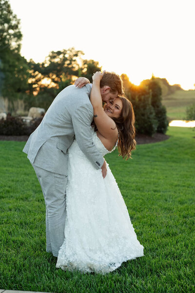 Bride and groom hugging outside of Raleigh wedding