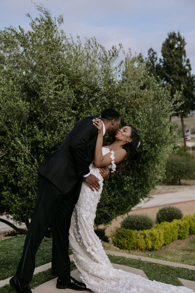 Chase dipping Keiyana at their wedding in Temecula.