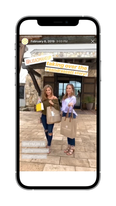 Two Women holding shopping bags