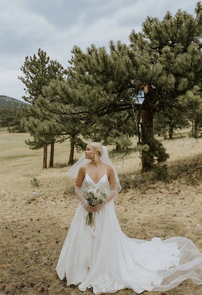 makeup artist smiling at the camera