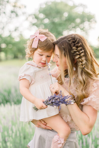 mom and daughter in a lavender field