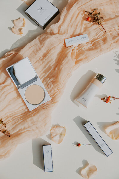 Beauty product flat lay photography with makeup