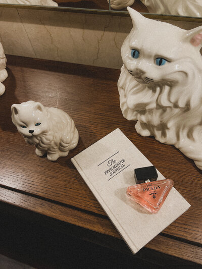 user generated content, prada paradoxe perfume, vintage cat figurines, organic social media growth. the five minute journal, product photography, washington dc blogger, dc influencer