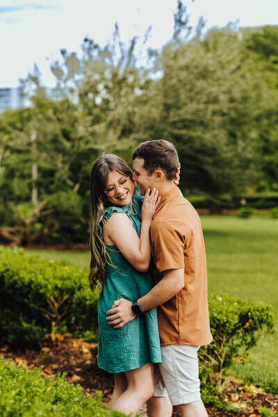Couples posing for their engagement photos in Baton Rouge