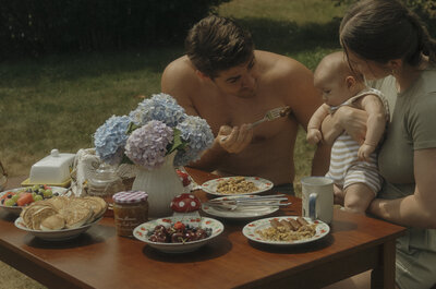 Family eating at the backyard