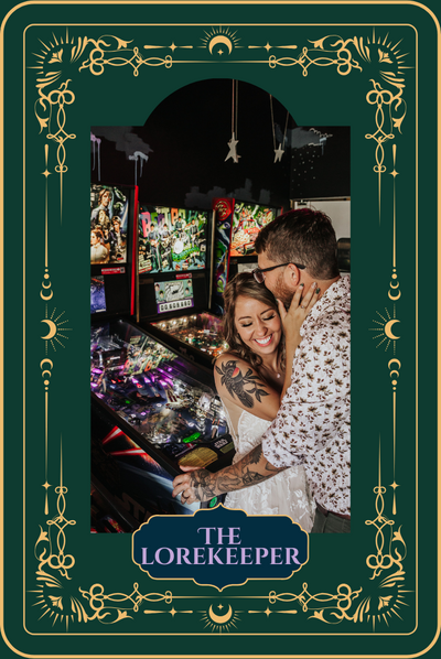 Playful Indianapolis elopement photography – couple laughing while playing pinball at Loom, a unique bar and laundromat arcade.