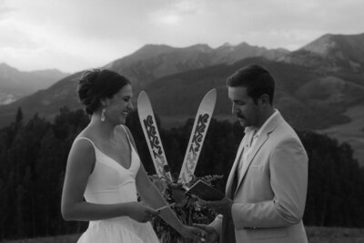 Bride and groom spinning on cabo san lucas beach