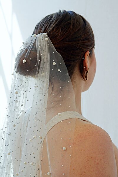 Link to more photos and details about the Sol modified a-line wedding dress style.