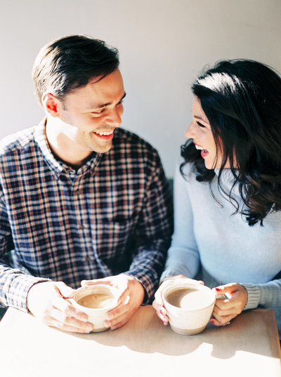 couple engagement session drinking coffee by natalie jayne photography