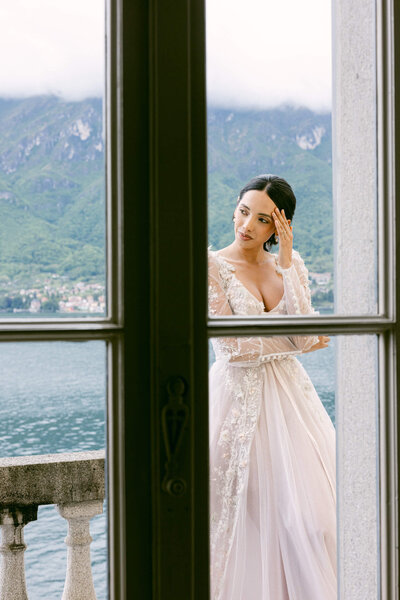 A wedding day bridal shot of a bride in her white dress at Villa Aura del Lago on lake como in Italy
