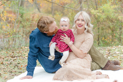 family of 3 during fall