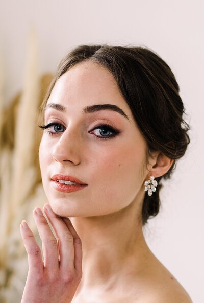 Dusky rose glowing elegant bridal makeup