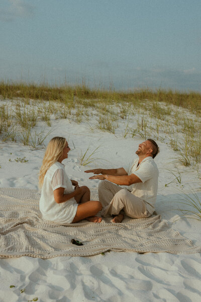 couple sitting on the beach