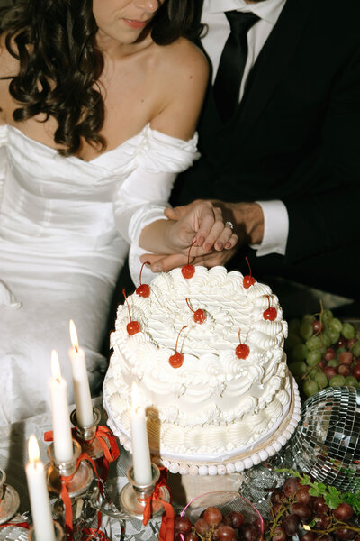 elegant classy editorial wedding, romantic moody candlelit with cherry vintage cake  in PEI