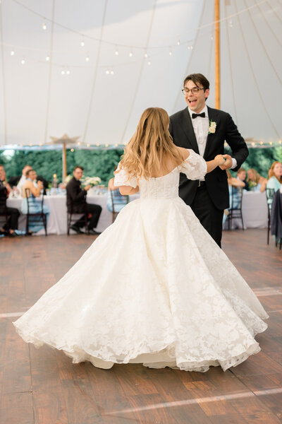 Groom smiling during first dance. Taken by DC Wedding Photographer Bethany Aubre Photography.