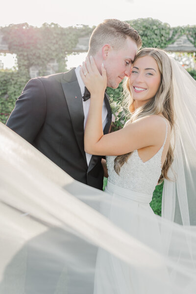 bride and groom embracing