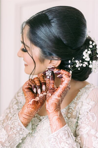 bride getting ready earring