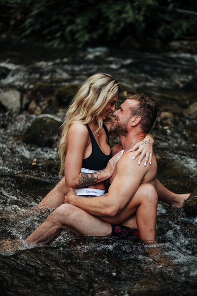 couple sitting in water