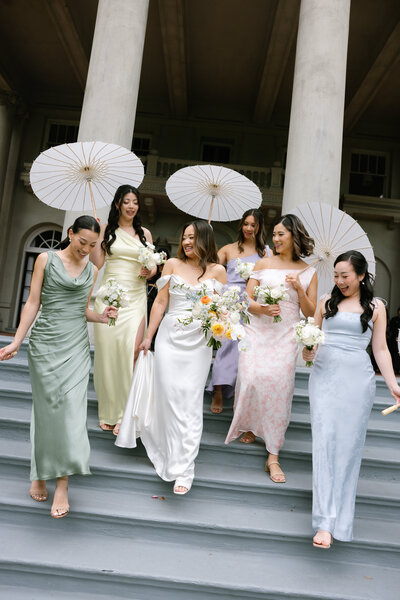 White modern elegant wedding in Penticton with bride holding her flowers