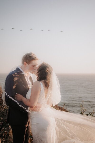 in love couple touch noses and smile in Denver Colorado