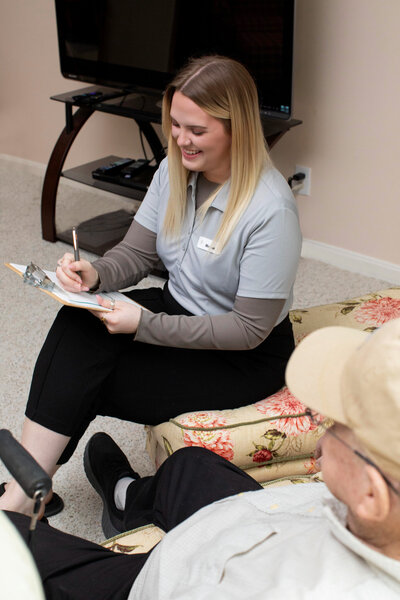 Caregiver catching up with client