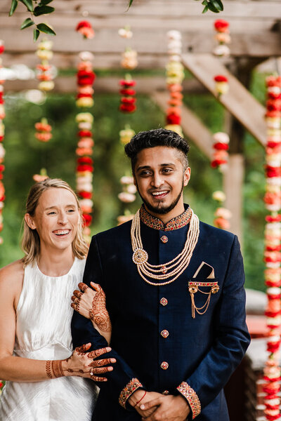 Bride and Groom standing together, Blended wedding at Peirce Farm at Witch Hill