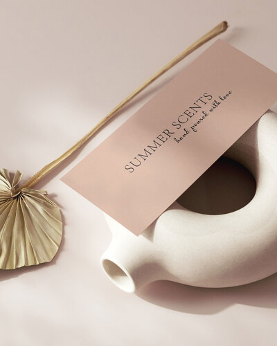Modern branding for a candle company, featuring clean typography and subtle boho accents.