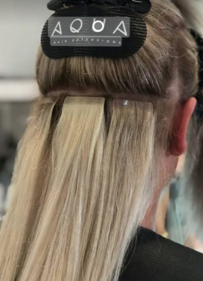 tape in hair extensions during process