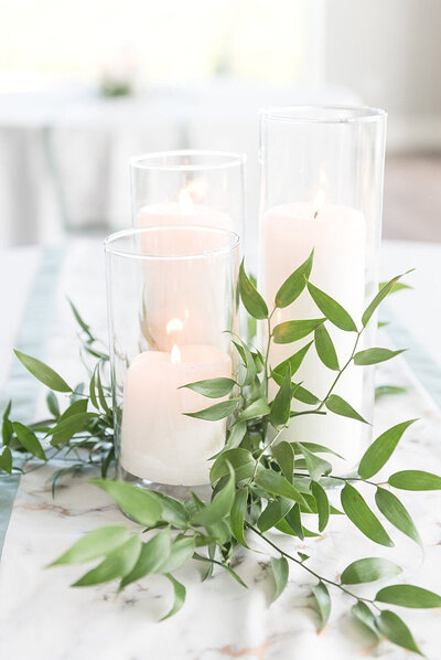 3 Candles and Greenery as Centerpiece