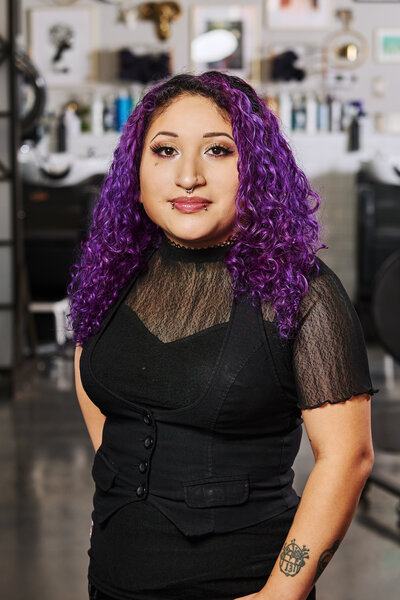 Headshot of Epoch Studio Salon's reservationist, Lizette