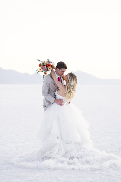 bride and groom embracing