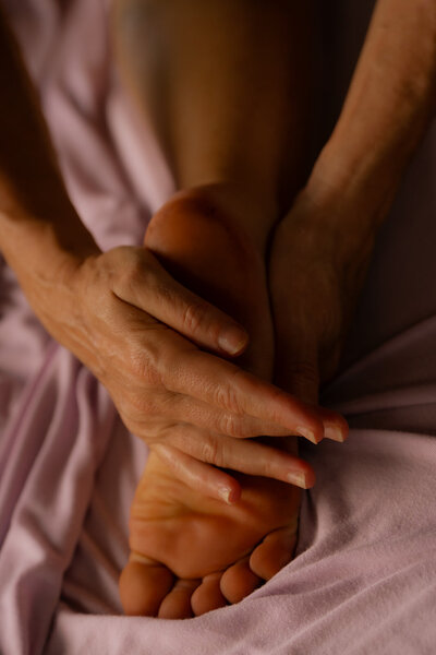 Nicole giving a relaxing massage to support overall wellness, calm the nervous system, and encourage healing at Love Light Wellness in Kauai
