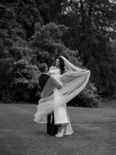 Editorial style portrait of a bride and groom during their luxury wedding in Leesburg, Virginia