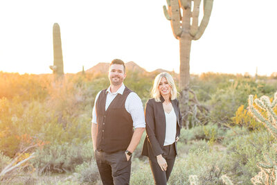 owners of save this memory standing in the desert by a cactus