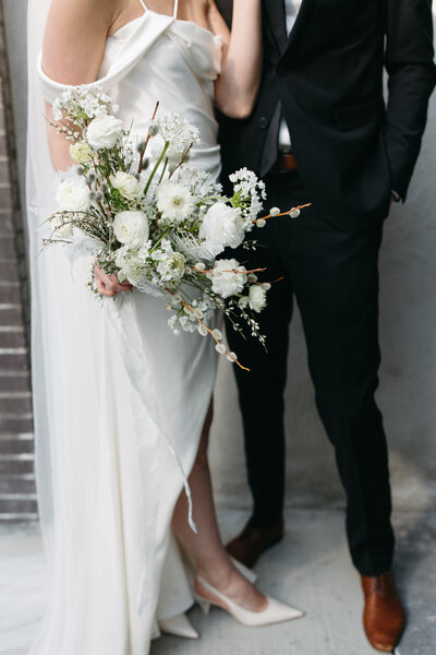 Couple holding bouquet